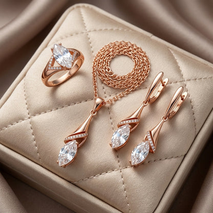 Schmuckset in Roségold mit weißem Zirkon im Rhombus-Design – Ring, Ohrringe und Halskette