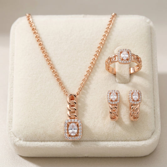 Schmuckset in Roségold mit weißem Zirkon im Quadratschliff – Halskette, Ohrringe und Ring